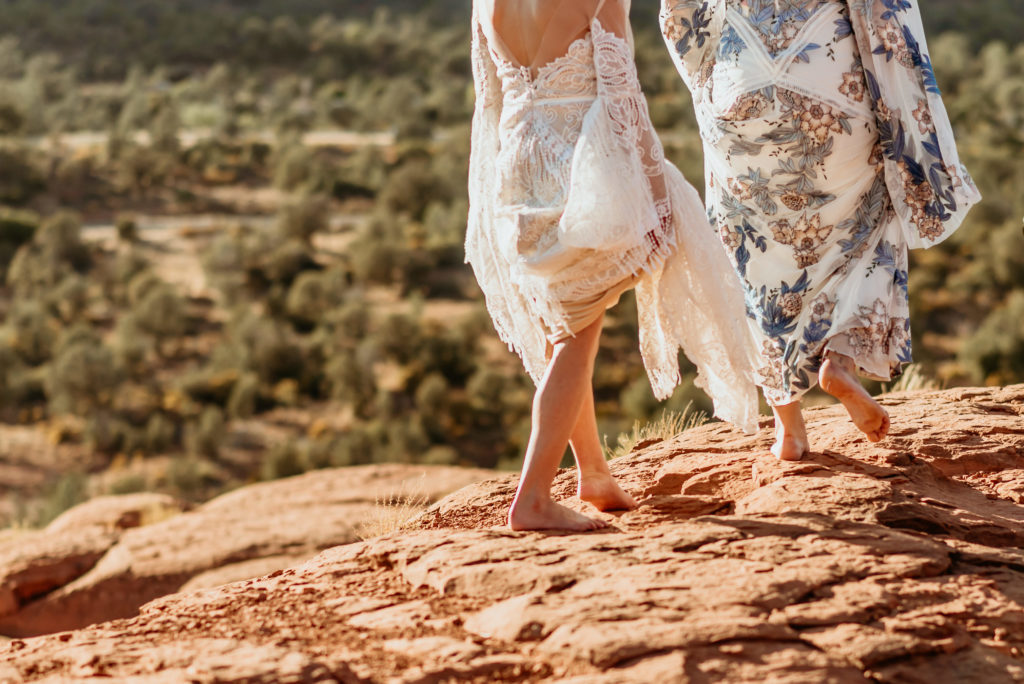 Barefoot brides on the Sedona red rocks