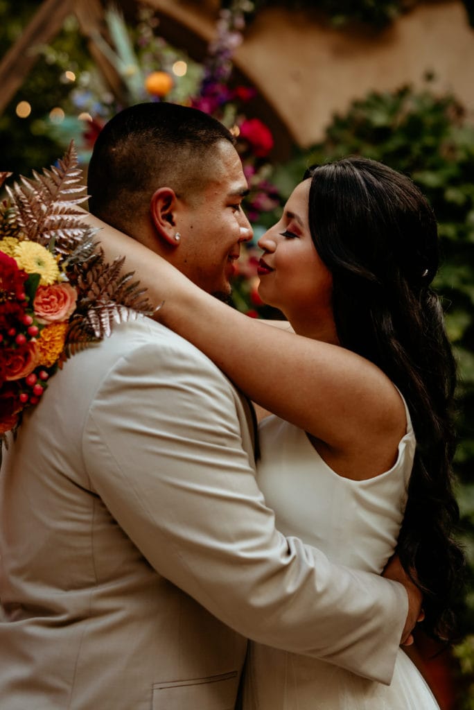 Bride and groom dancing in the Tlaquepaque courtyard