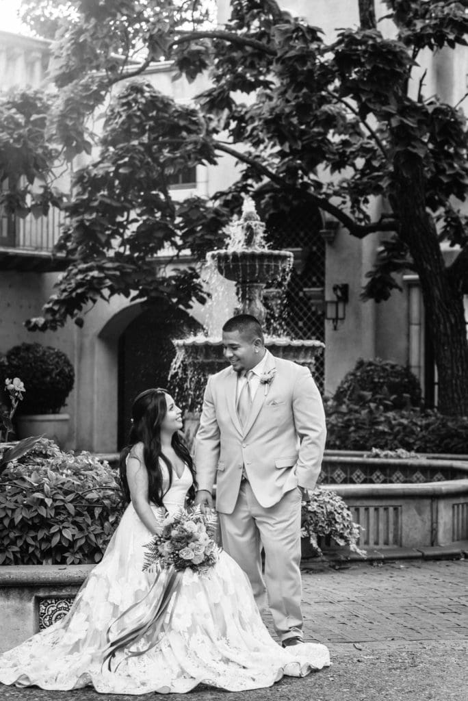 Couple looking at each other in front of one of the many Tlaquepaque fountains