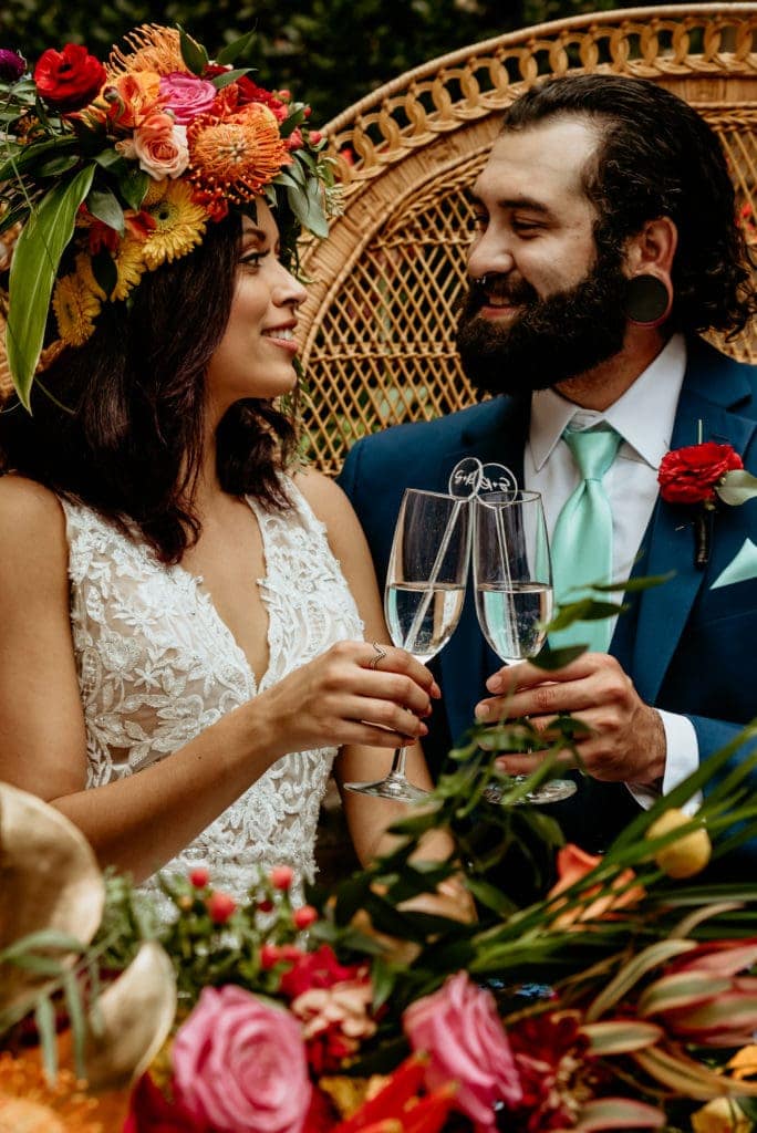 Bride and groom toasting champagne at their Tlaquepaque intimate wedding reception