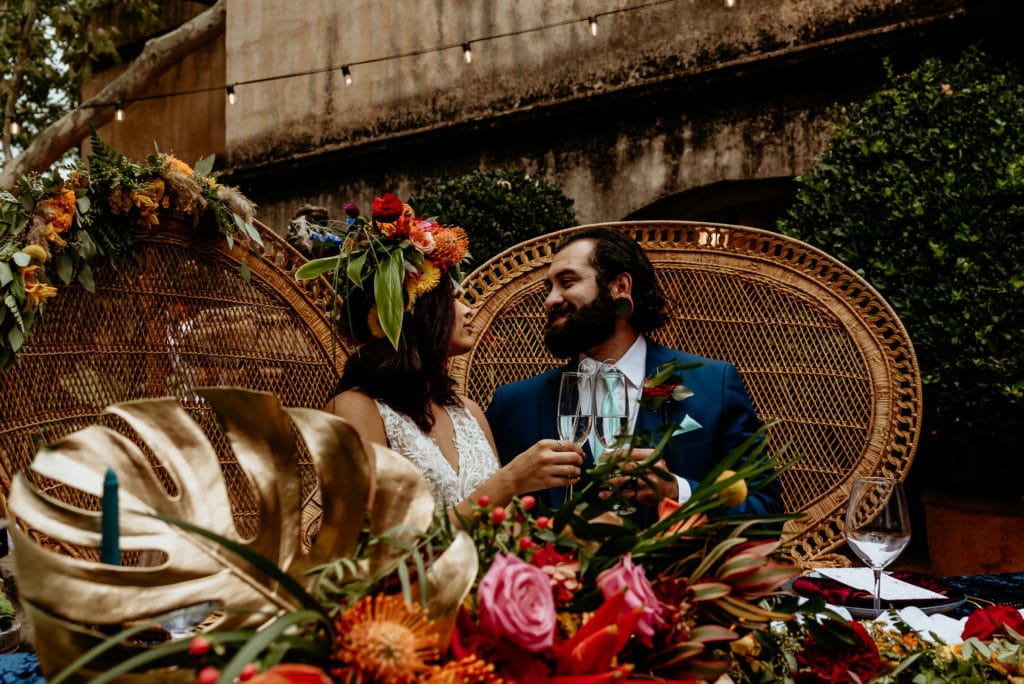Bride and Groom toast to their wedding at the Tlaquepaque Wedding courtyard