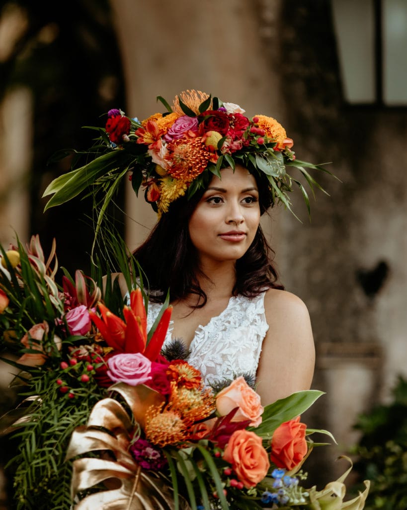 Bridal portrait with tropical headdress and bouquet