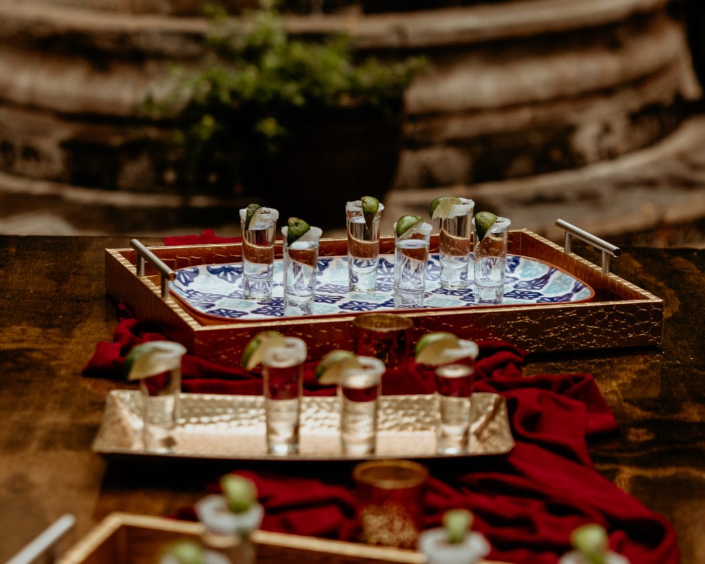 Tequila shots with salt and lime covered rims for the intimate wedding reception at Tlaquepaque