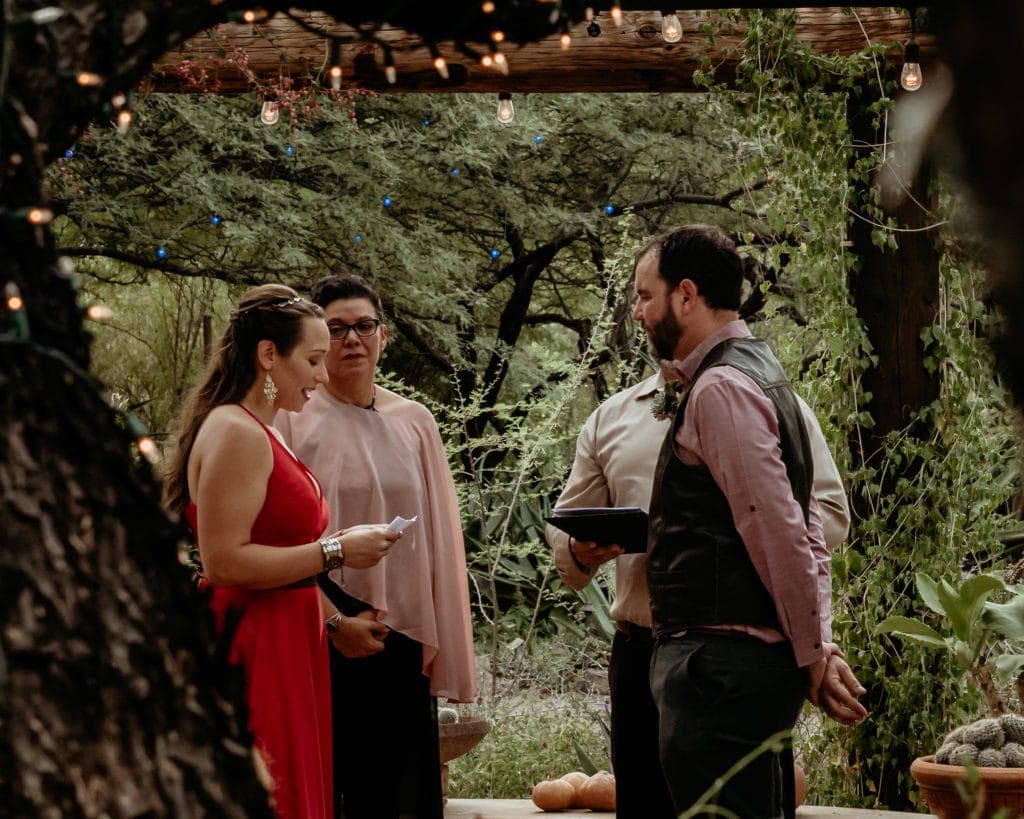 Bride reading her vows during Tucson Garden Wedding