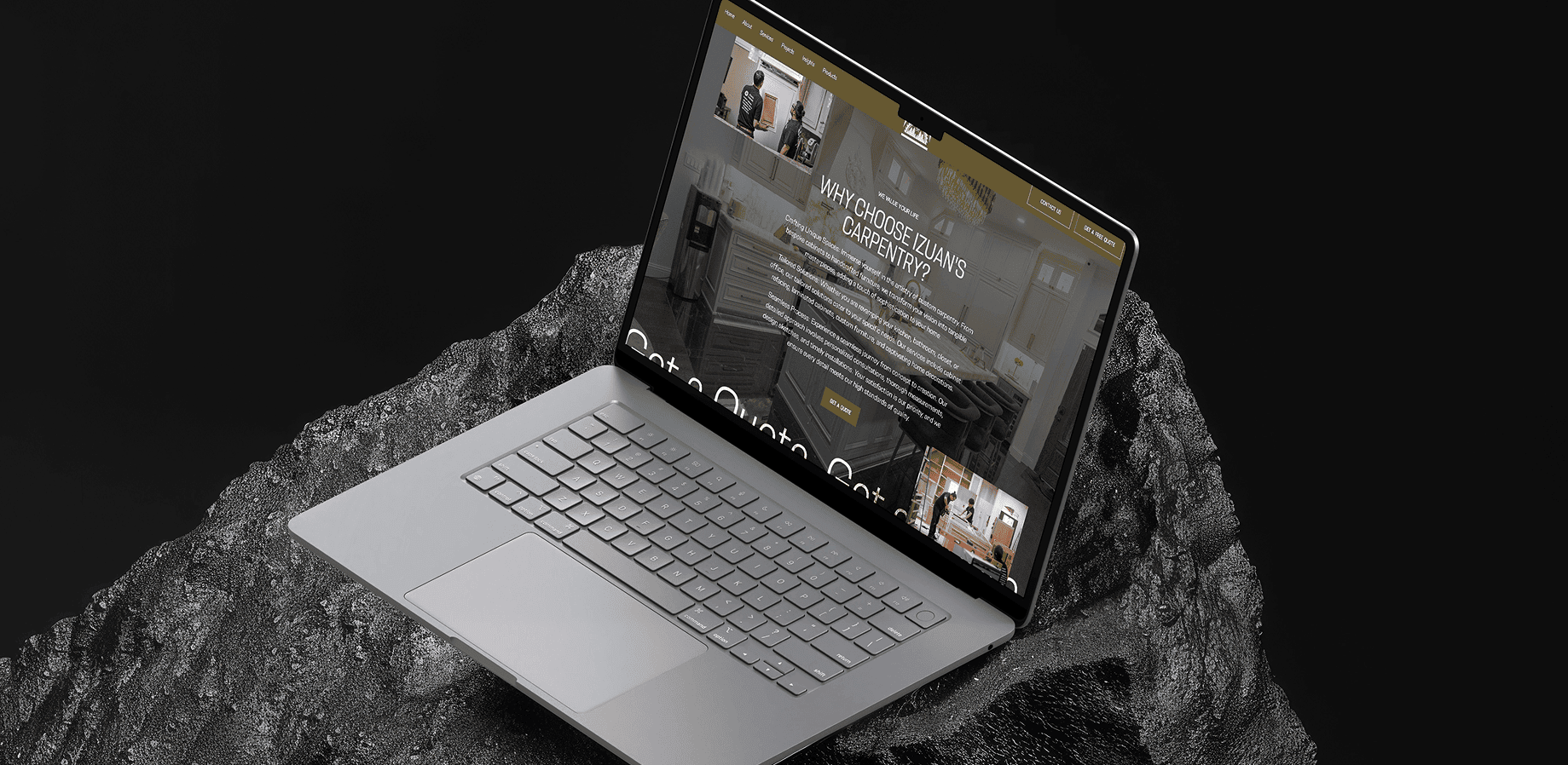 Laptop displaying TeamForce Solutions website on a rocky surface.