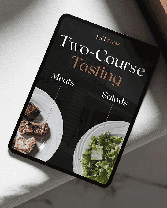 Two-course tasting menu with steak and salad on a smartphone screen.