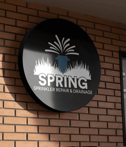 Spring Sprinkler Repair & Drainage logo sign illustrating new brand identity by TeamForce Solutions.