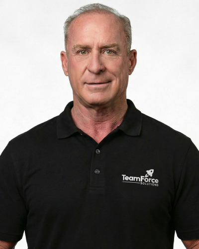 Professional man wearing TeamForce Solutions polo shirt for SEO.