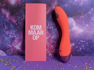 De linda. G-spot vibrator naast de gebruiksaanwijzing.