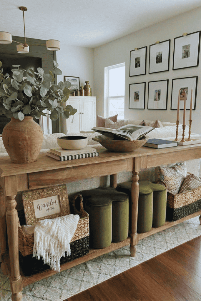 Elegant living room console table with decorative vases, framed art, and cozy accents for stylish ho.