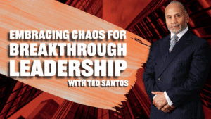 Ted Santos in a suit stands confidently on the right. The text reads: "Embracing Chaos for Breakthrough Leadership with Ted Santos." Modern buildings and a dramatic orange brushstroke highlight the spirit of embracing chaos for true breakthrough leadership.