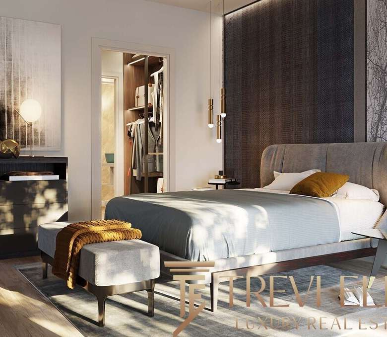 Элитная спальня с современным дизайном, яркими акцентами и уютной атмосферой, идеально подходящей для проживания роскошных личностей.