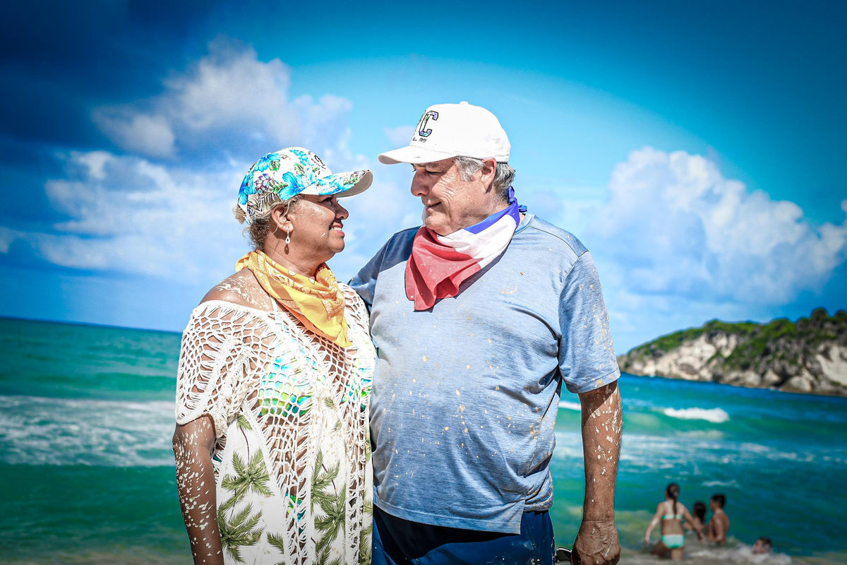 Punta Cana Senior couple smiling at each other on the beach in Punta Cana.