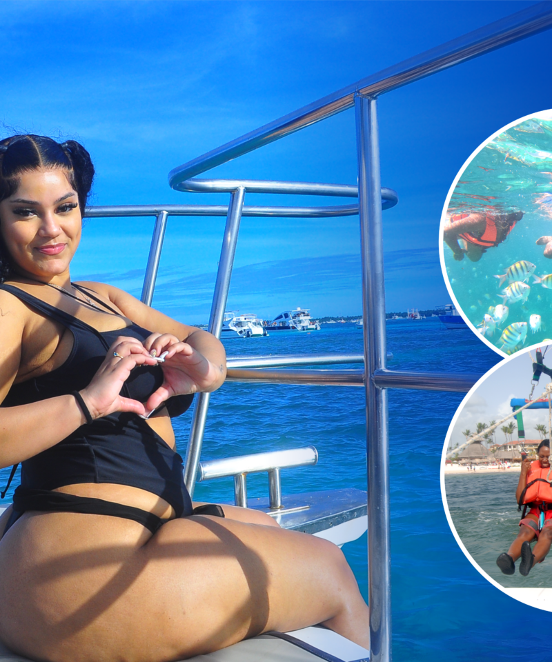 Punta Cana Woman enjoying a boat trip with snorkeling and parasailing adventures nearby.