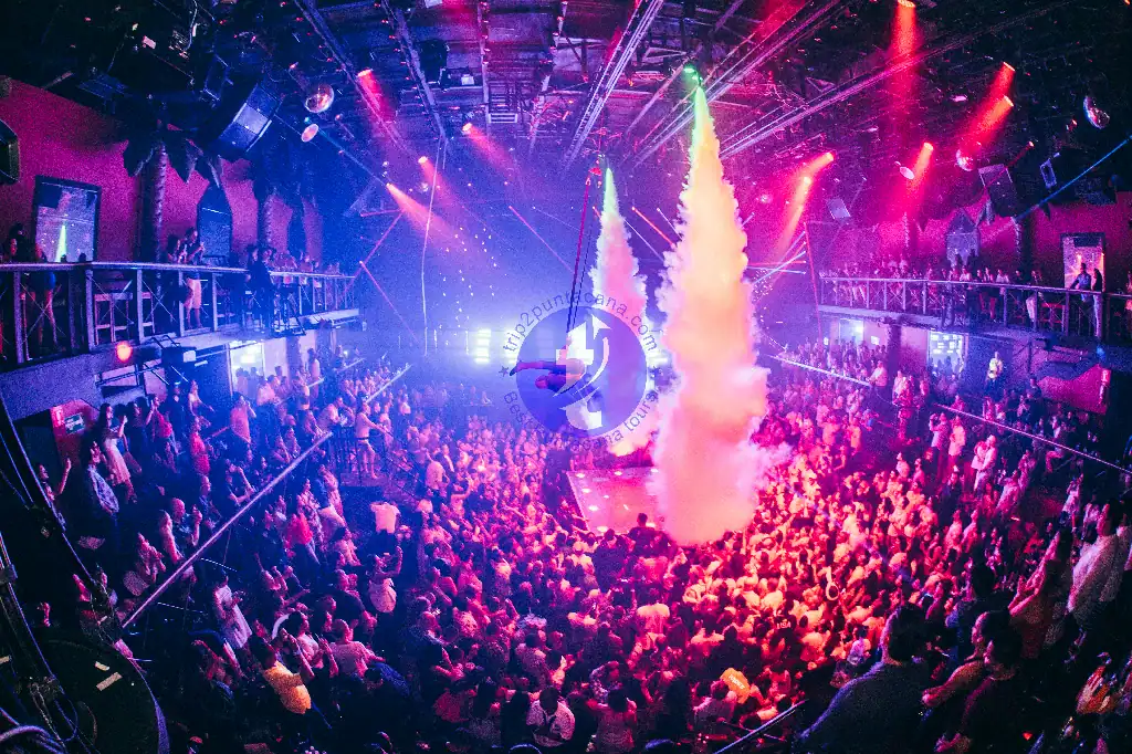 Punta Cana Nightclub dance floor with colorful lights and a lively crowd in Bavaro, Punta Cana.