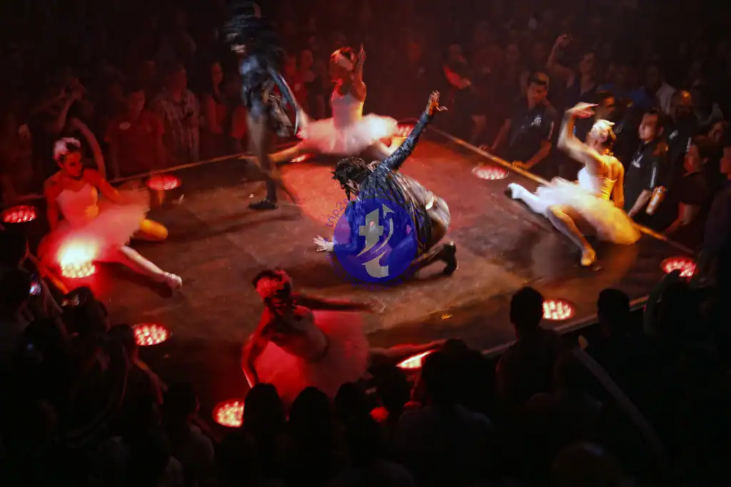 Punta Cana Dancer performing flamenco on stage with colorful costumes and dramatic lighting in Punta Cana.