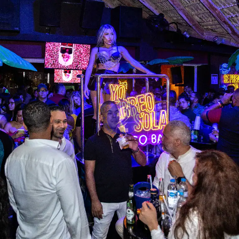 Punta Cana Nightlife entertainment featuring a female performer on stage at a lively Punta Cana club.