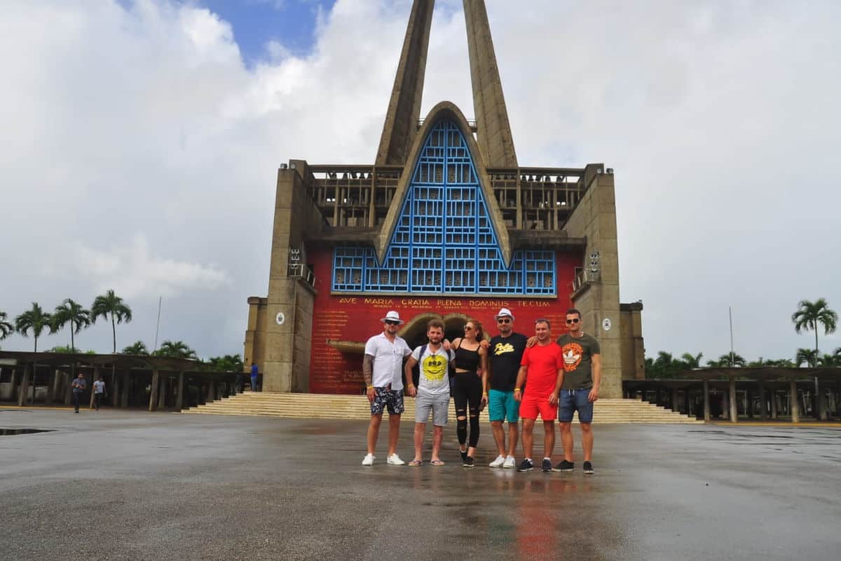 Punta Cana Group of tourists visiting Basilica Cathedral in Punta Cana, Dominican Republic.