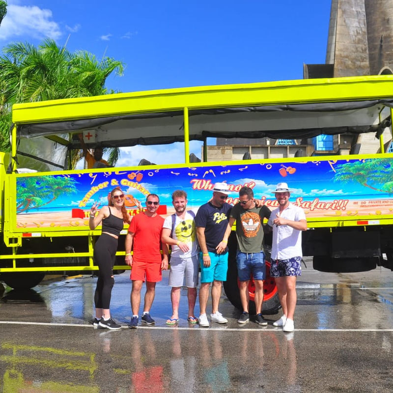 Punta Cana Bright yellow tour bus with tourists in Bavaro, Punta Cana, Dominican Republic.