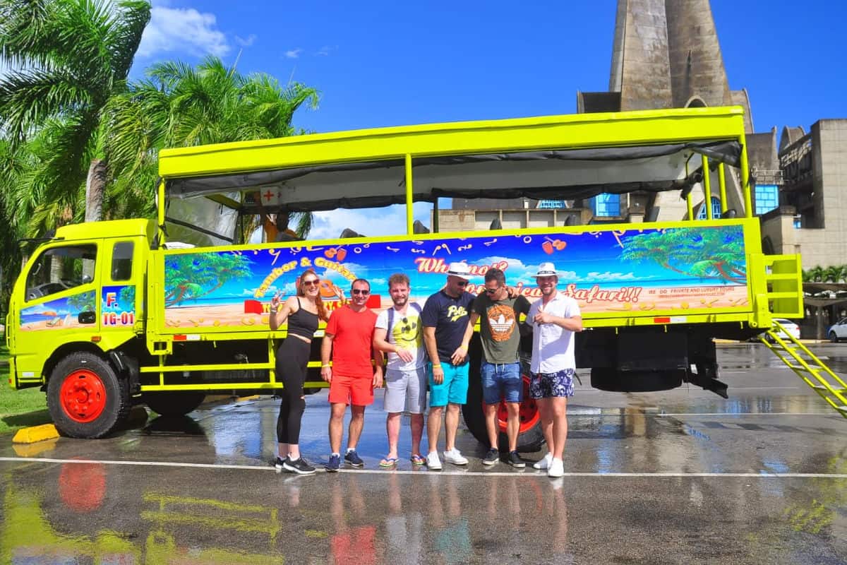 Punta Cana Bright yellow tour bus with tourists in Bavaro, Punta Cana, Dominican Republic.