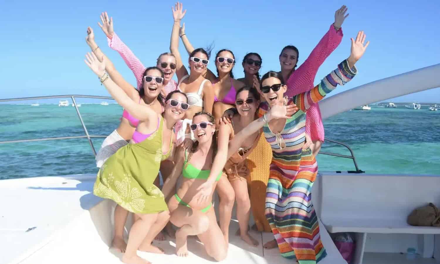 Punta Cana Smiling women on a boat in Punta Cana, enjoying a fun day on the water.