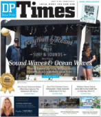 Front page of a newspaper titled "DP Times" featuring a surf and music store, with three people standing outside and headlines about sound waves and ocean waves.