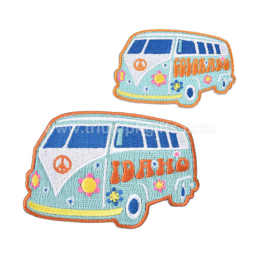 Colorful embroidered patches of a retro-style van with "Colorado" and "Idaho" text, peace symbols, and floral designs, perfect for customizing clothing and accessories.