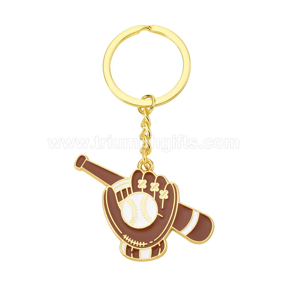 Gold baseball glove and bat keychain with a white baseball in the center, designed for sports fans and team awards. Perfect for baseball enthusiasts, memorabilia, or promotional gear.