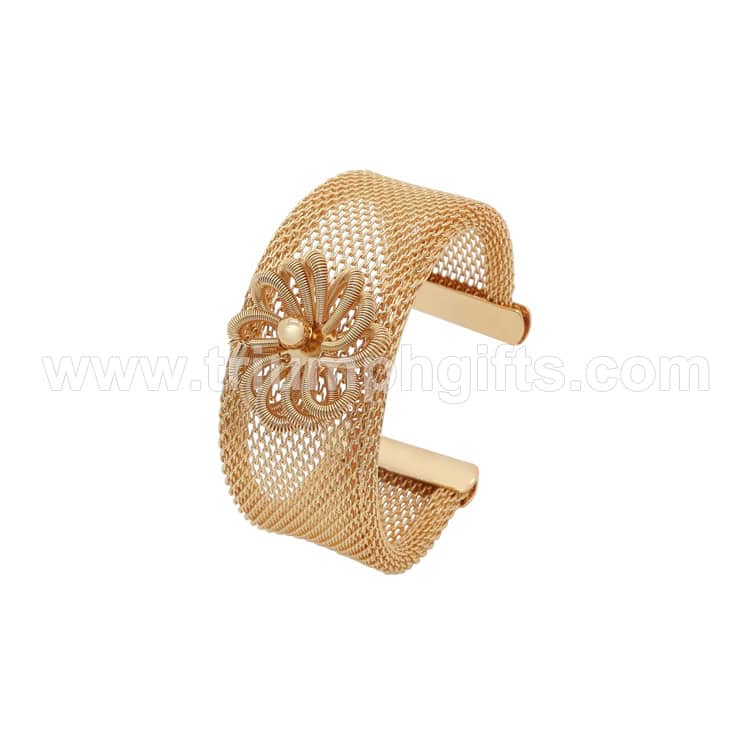 Elegant gold-tone cuff bracelet featuring a floral design with pearl accents, perfect for promotional gifts, awards, or personalized jewelry. Customizable for events and corporate promotions.