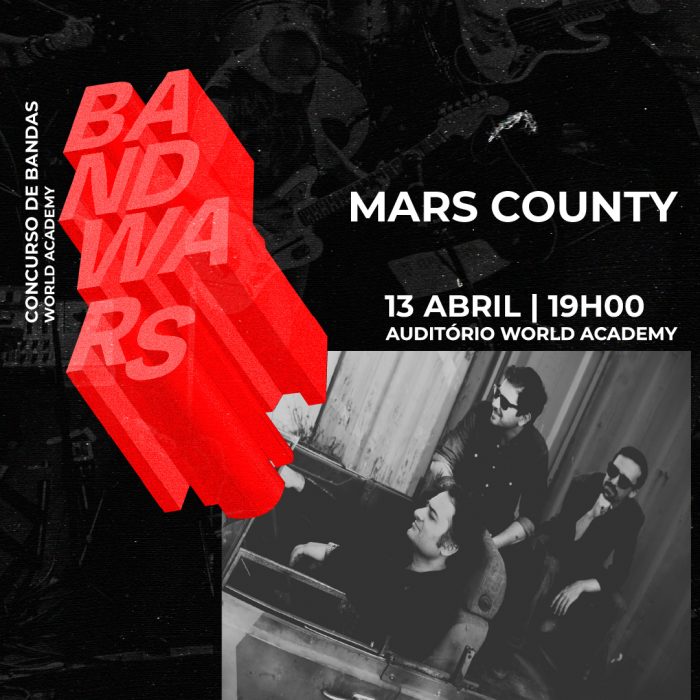 Imagem de banda a atuar em evento no World Academy.