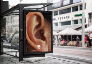 Anúncio publicitário de ouvido com música.