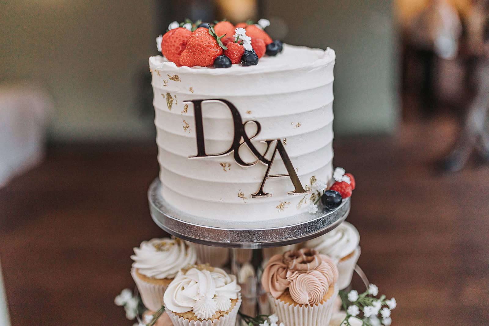 Wedding cake by GavBakes displayed at Titchwell Manor – Norfolk wedding photographer