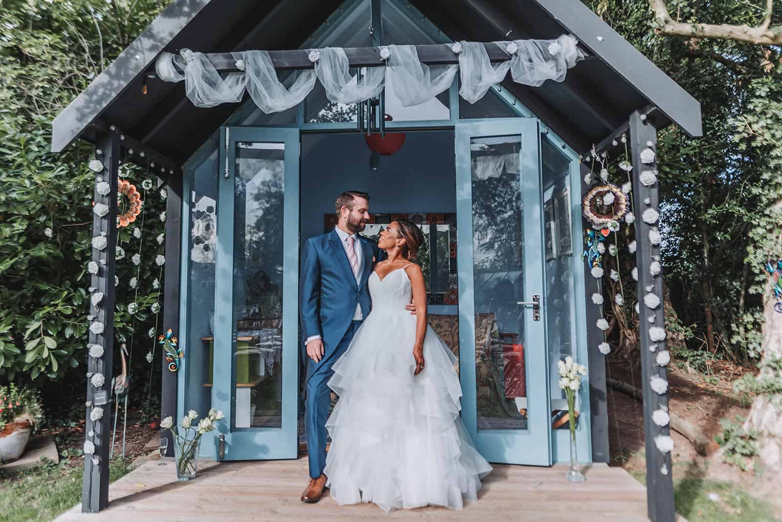 Natural portrait of Milla and James sharing a smile – Norfolk wedding photographer capturing authentic emotion