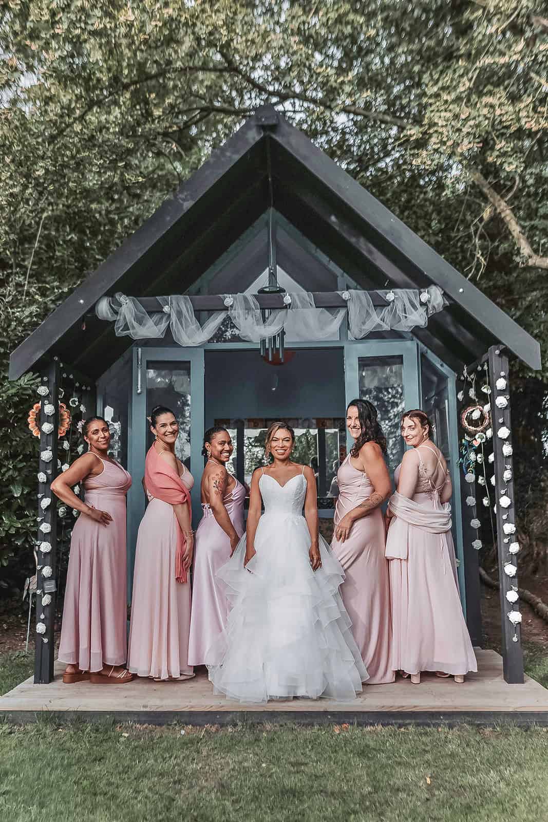 bridesmaids and laughter at Wattle Cottage garden reception – Norfolk wedding photographer”