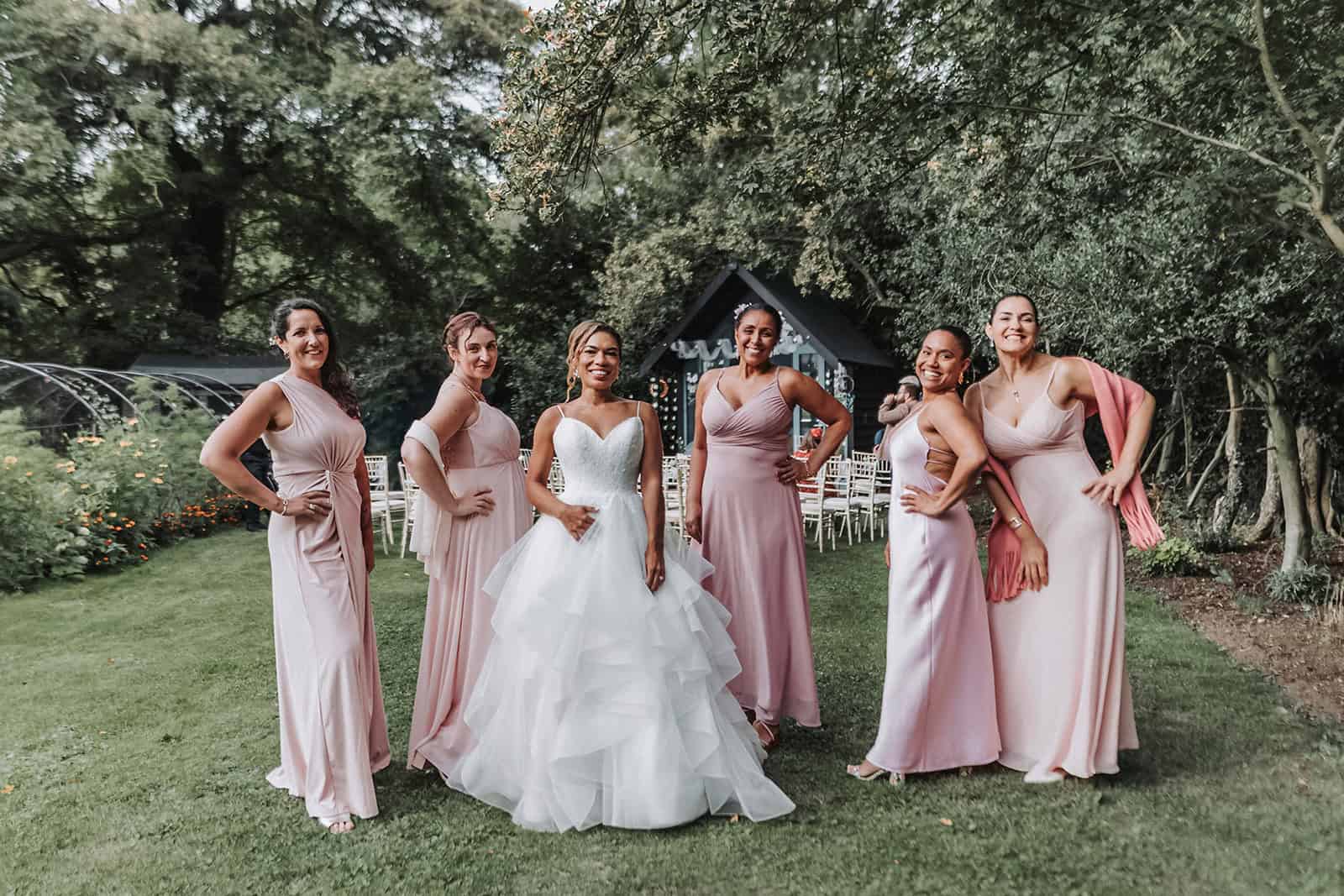 Candid guest interactions and laughter at Wattle Cottage garden reception – Norfolk wedding photographer
