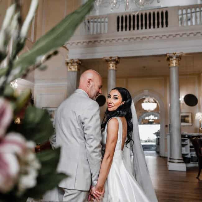 ana and mark outside assembly house taken by an assembly house wedding photographer