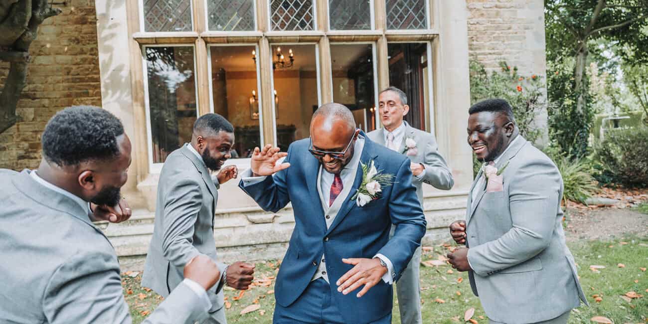 cambridgeshire wedding photographer groom and grooms men haycock manor