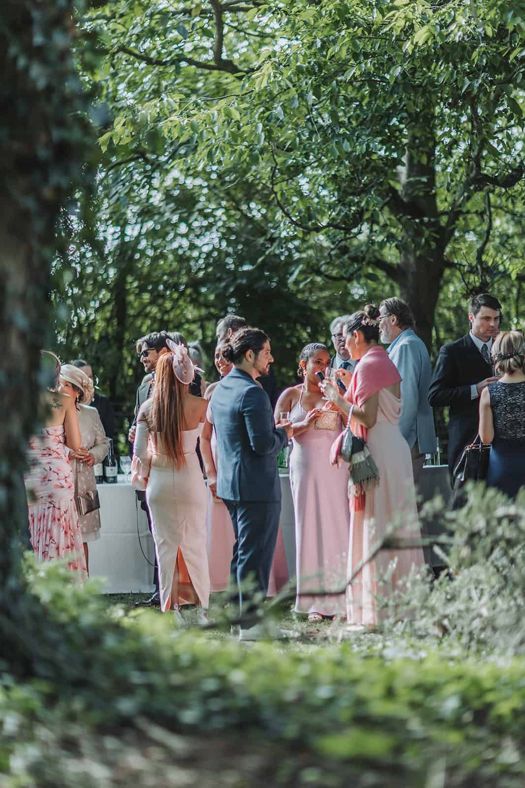 Guests arriving for a relaxed outdoor wedding in Norfolk countryside