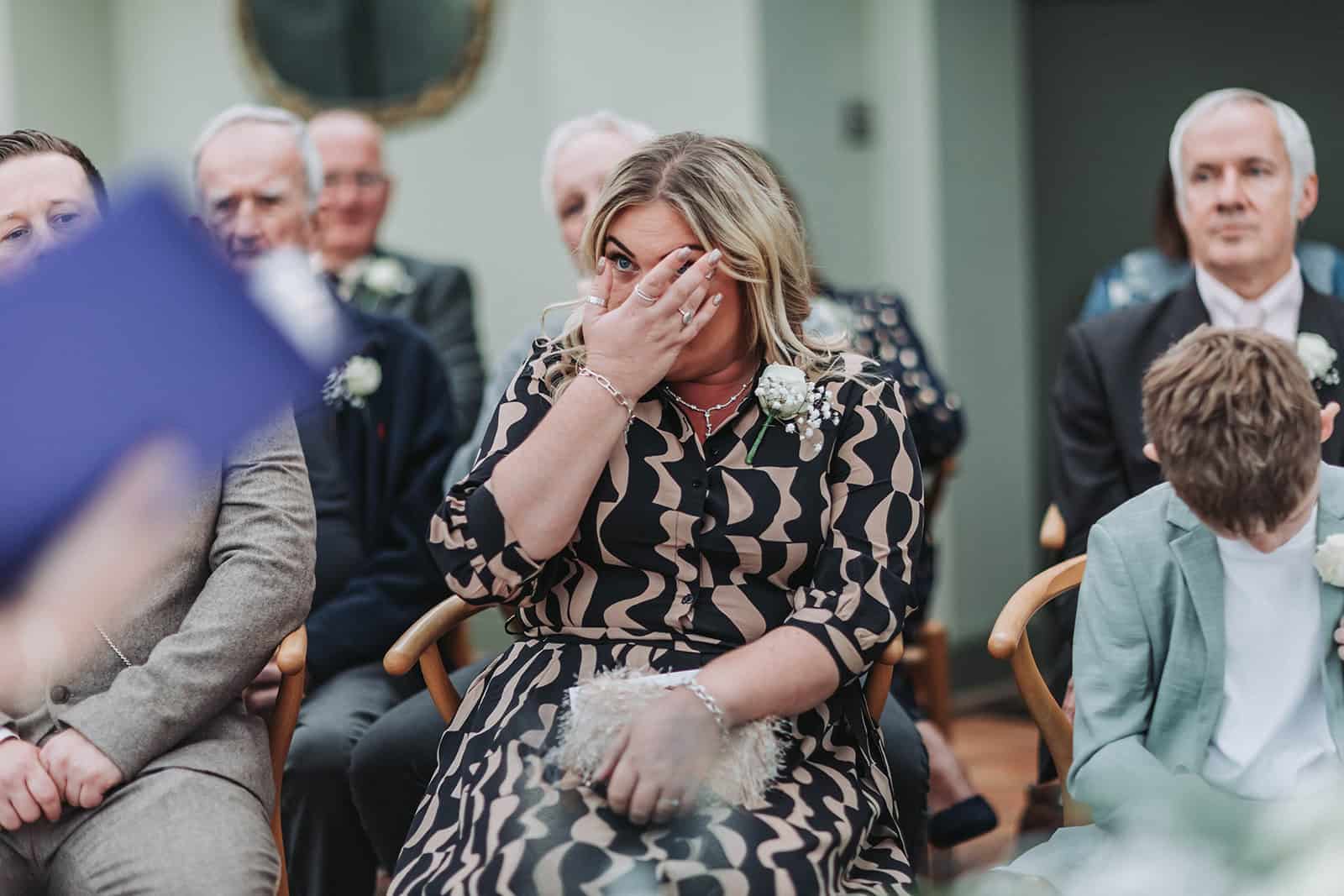 LGBTQ couple portrait in coastal gardens at Titchwell Manor – Norfolk wedding photographer”