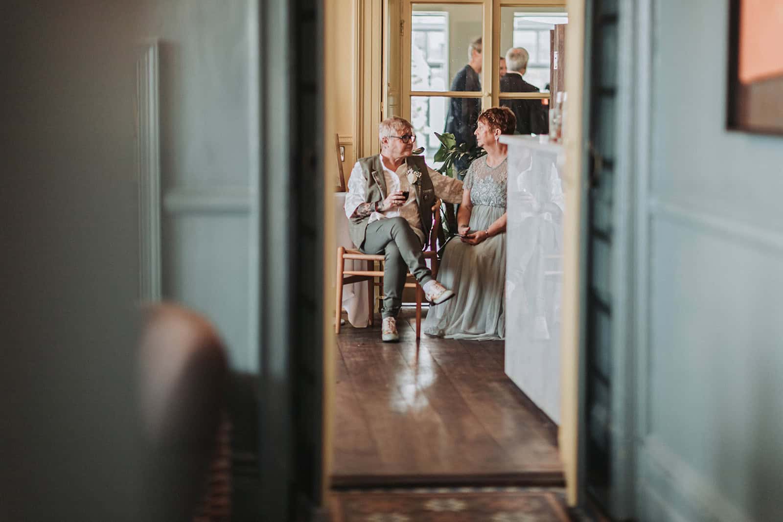LGBTQ couple portrait in coastal gardens at Titchwell Manor – Norfolk wedding photographer