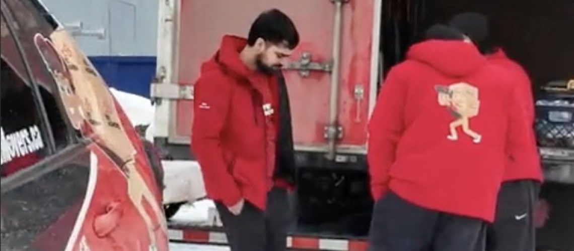 the yeg movers crew prepares for a residential move with a fully equipped moving truck, delivering reliable service in all weather conditions across edmonton.