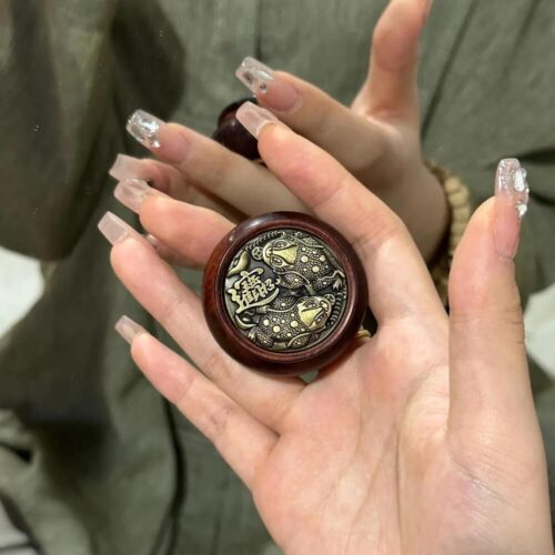 犀牛角紫檀聚寶盆轉轉手把件
