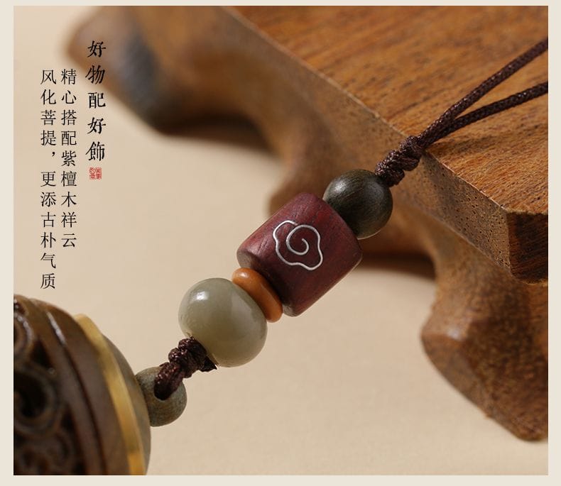 綠檀木玲瓏鏤空手機鏈香囊球