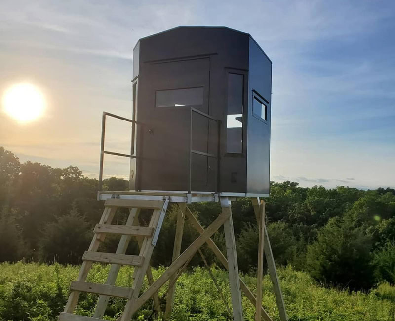 deer stand blind in field