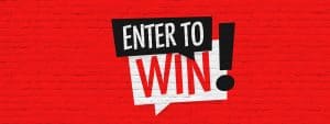 Rote Backsteinwand im Hintergrund mit auffälligem Schriftzug „ENTER TO WIN!“ in schwarzen und weißen Buchstaben in dynamischer Sprechblase – ideal für Gamification-Software, Gewinnspiele und Online-Wettbewerbe.
