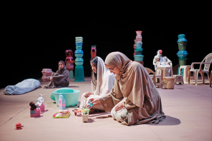Girls in theatre at New Yrok University Abu Dhabi Yalla - Abu Dhabi Life Magazine Edition 19 (September 2022)