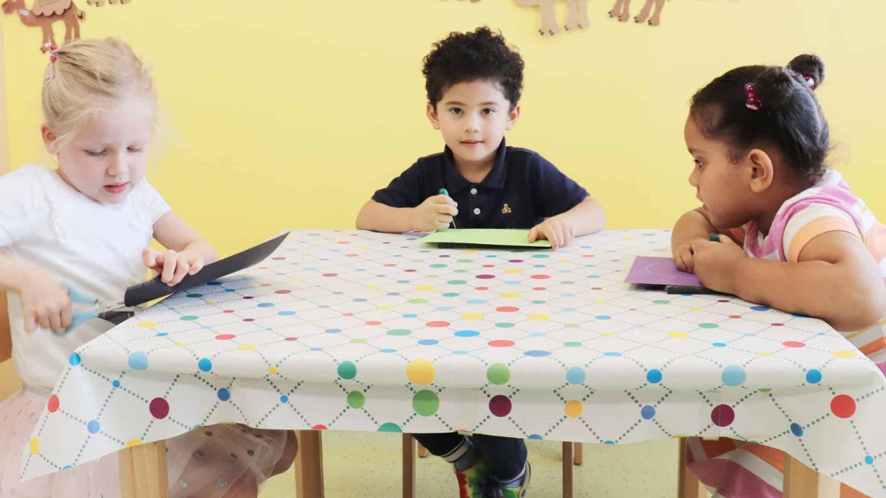 Children engaging in educational activities at Yalla Dubai.