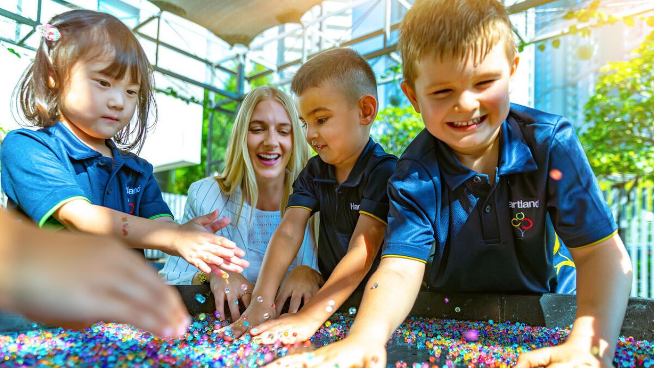 Yalla Dubai Life - Children engaging in educational activities at Hartland International School Duba.
