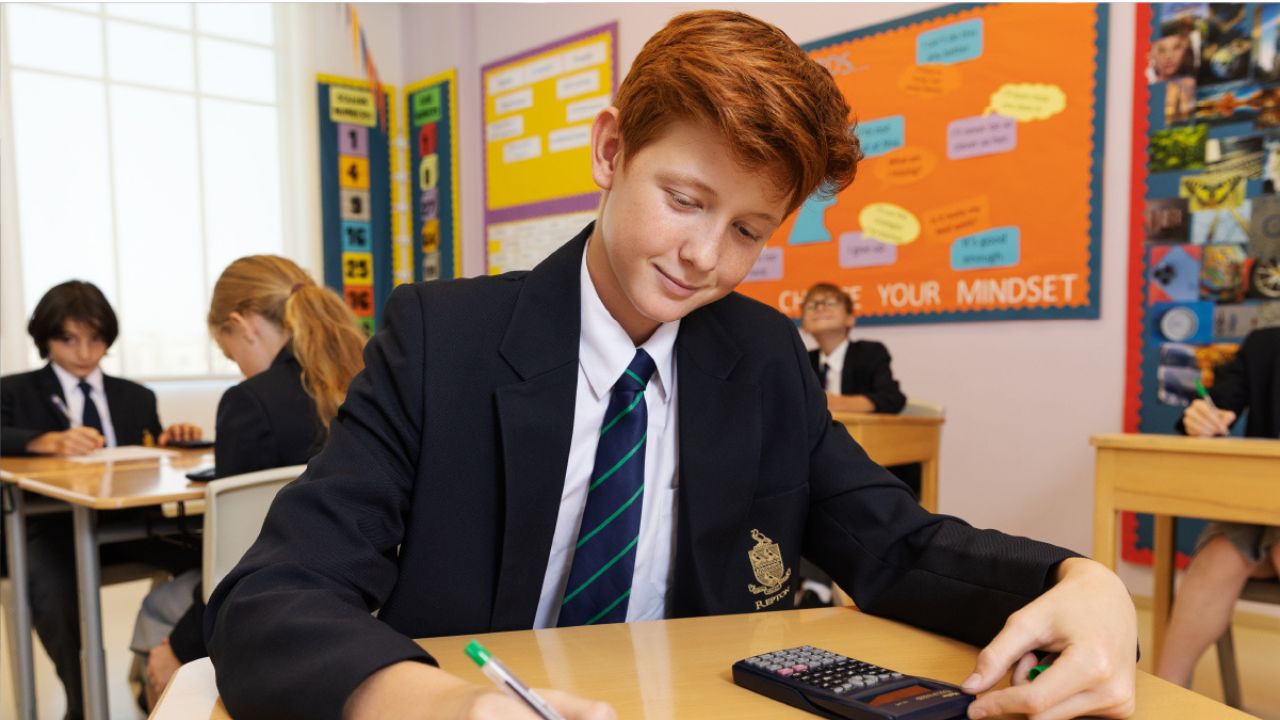 Young student studying in Repton Al Barsha classroom.