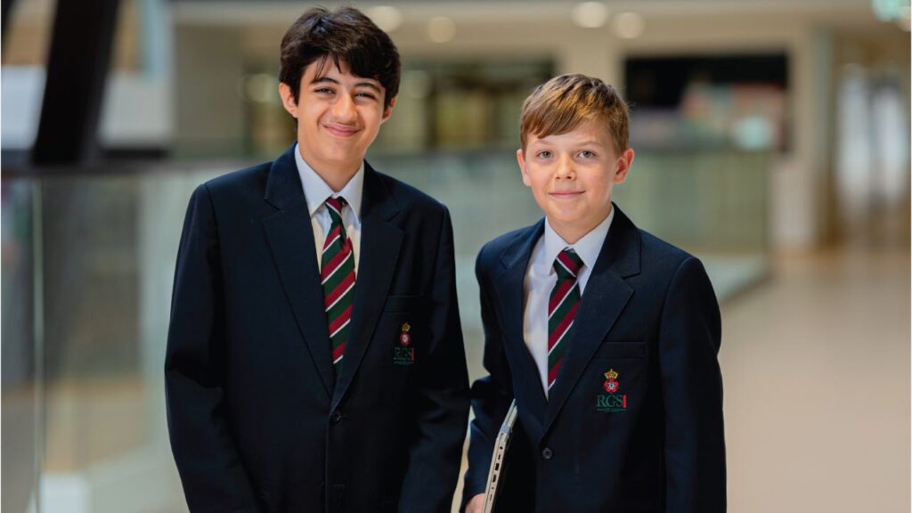 Two boys in school uniforms at The Royal Grammar School Dubai.
